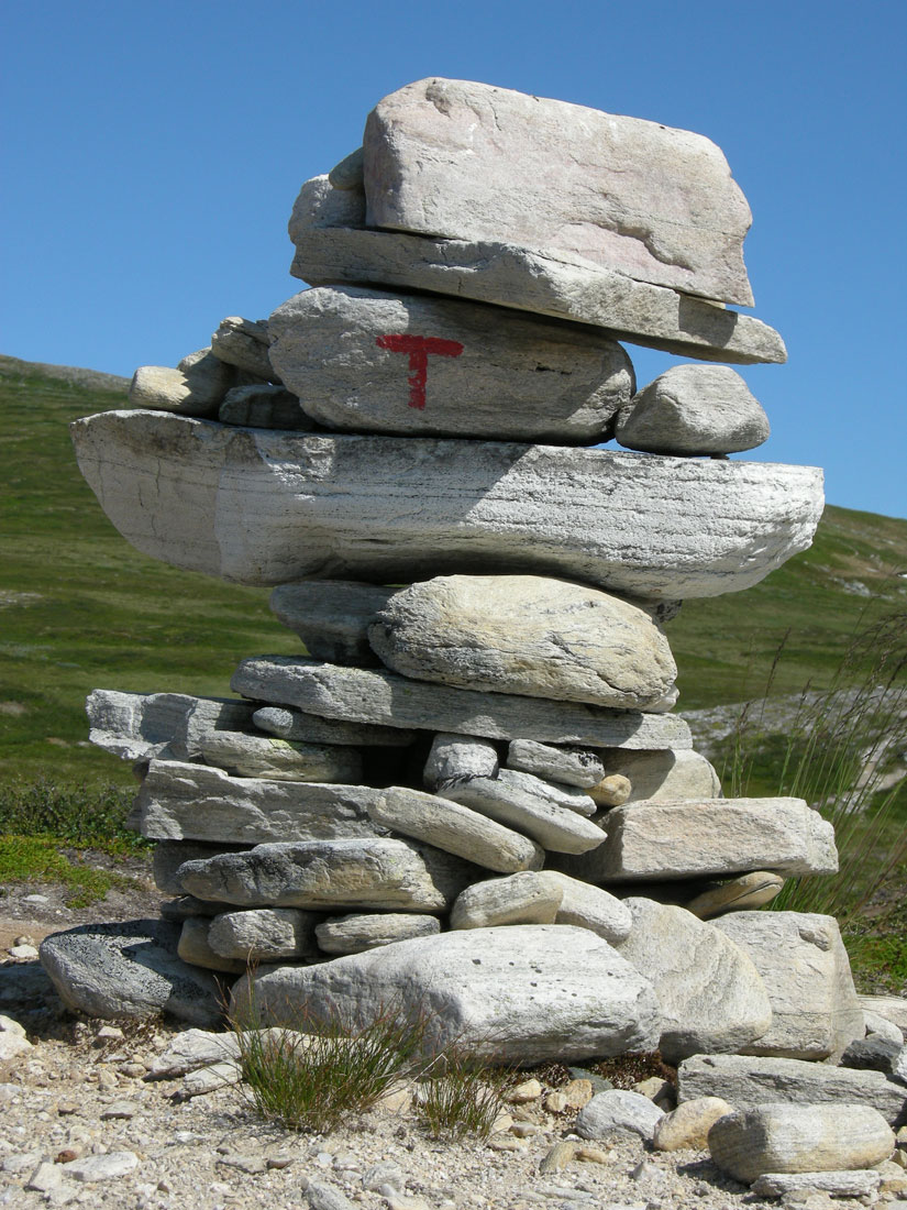 DNT marking cairns are built high with marking designed to be visible even when the ground is covered by snow